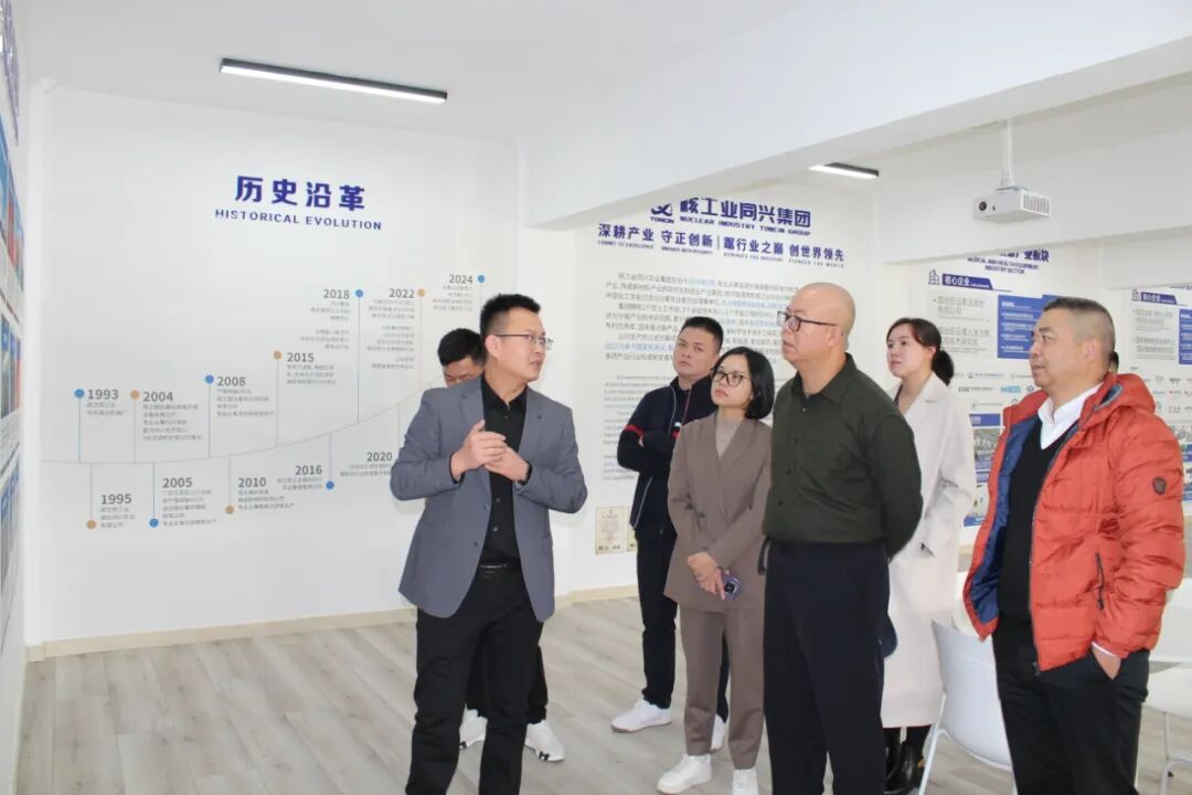 Вэнь Цзиньчуань, председатель Meijiang Group, и делегация посетили группу Toncin для обмена мнениями